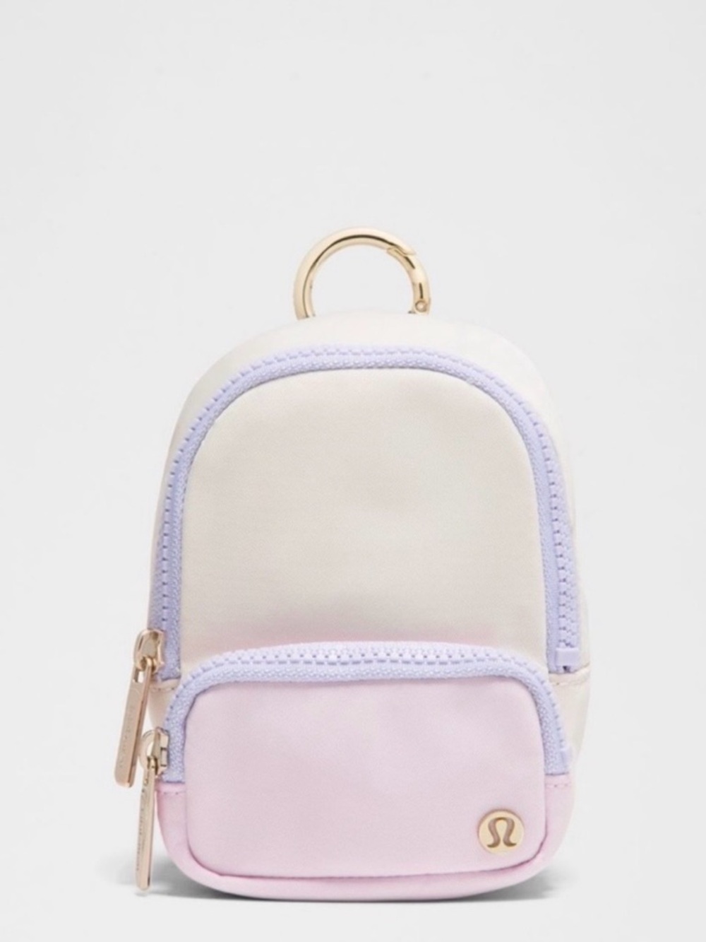 lululemon two-tone mini backpack keychain in cream, pastel pink & lavender